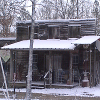 Snow covering the general store.